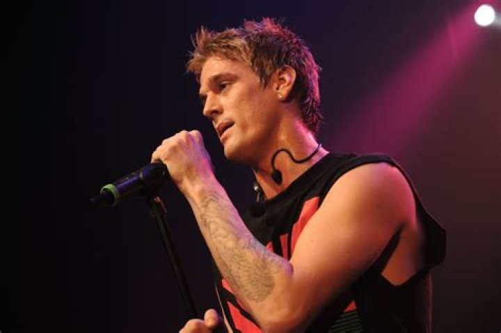 Aaron Carton performing on the stage