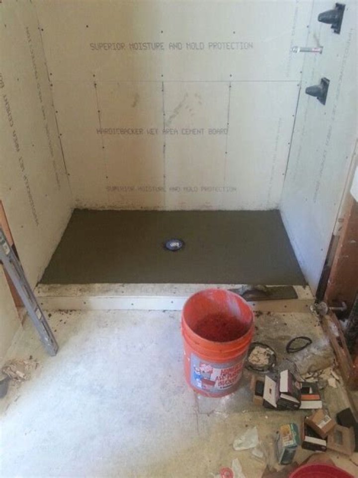 Can you tile over hot mop?