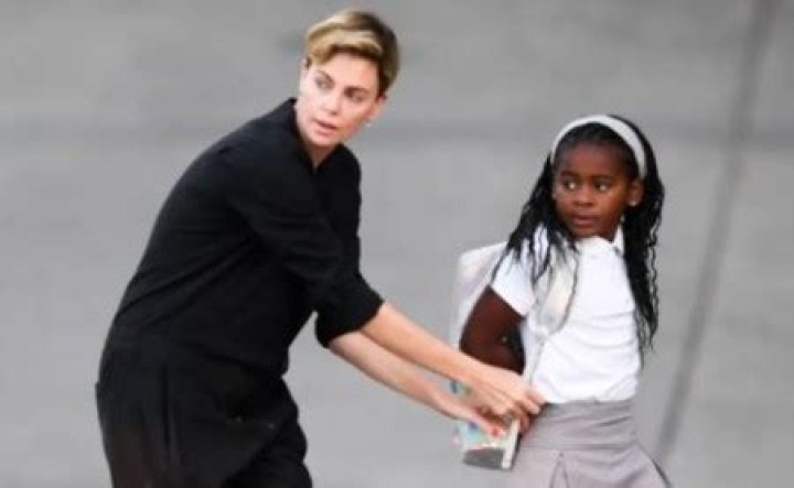 Charlize is very protective of her daughters.