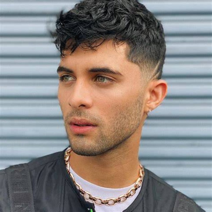 Erick Brian Colon posing for a photoshoot.