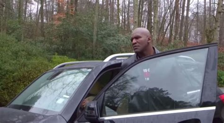 Evander Holyfield with his car (Source: MercedesBlog)