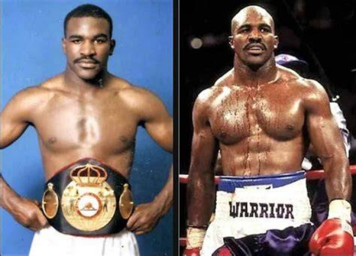Holyfield with his belts(Source: Beats, Boxing and Mayhem)
