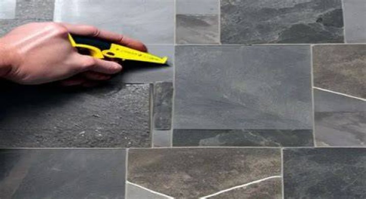 How do you cut veneer stone?