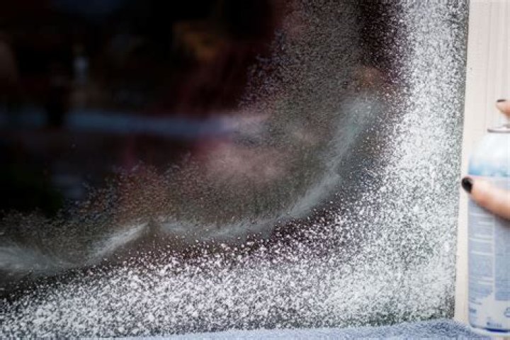 How do you get fake snow spray off Windows?