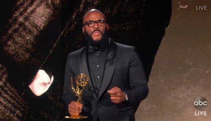 Tyler Perry receiving an award.
